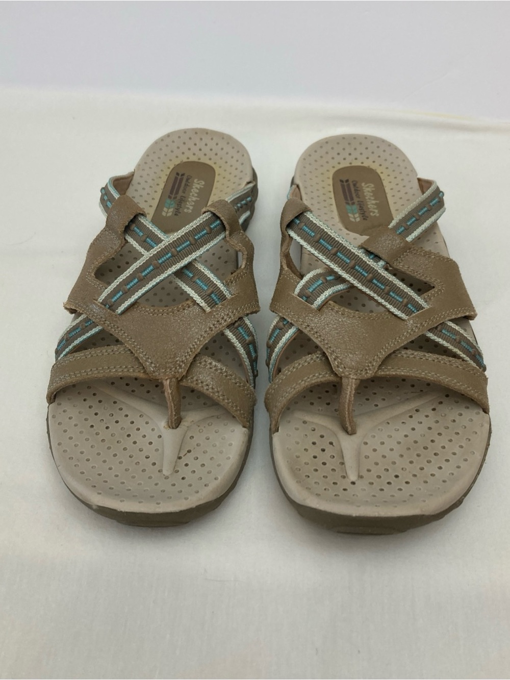 Skechers Women’s Strappy Sandals with Light Teal Accents size 8.
